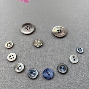 Vintage Mother Of Pearl Buttons. Lot Of 11 Two Hole And Four Hole Round Buttons